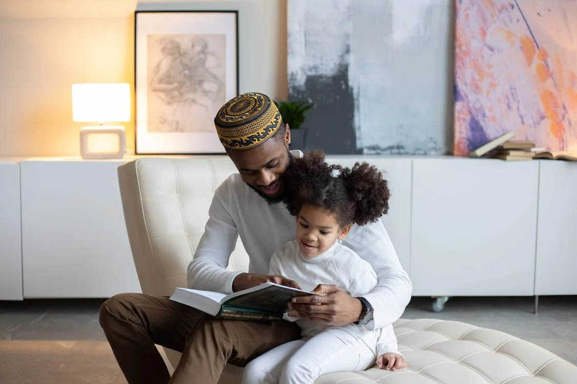 Father reading to a child